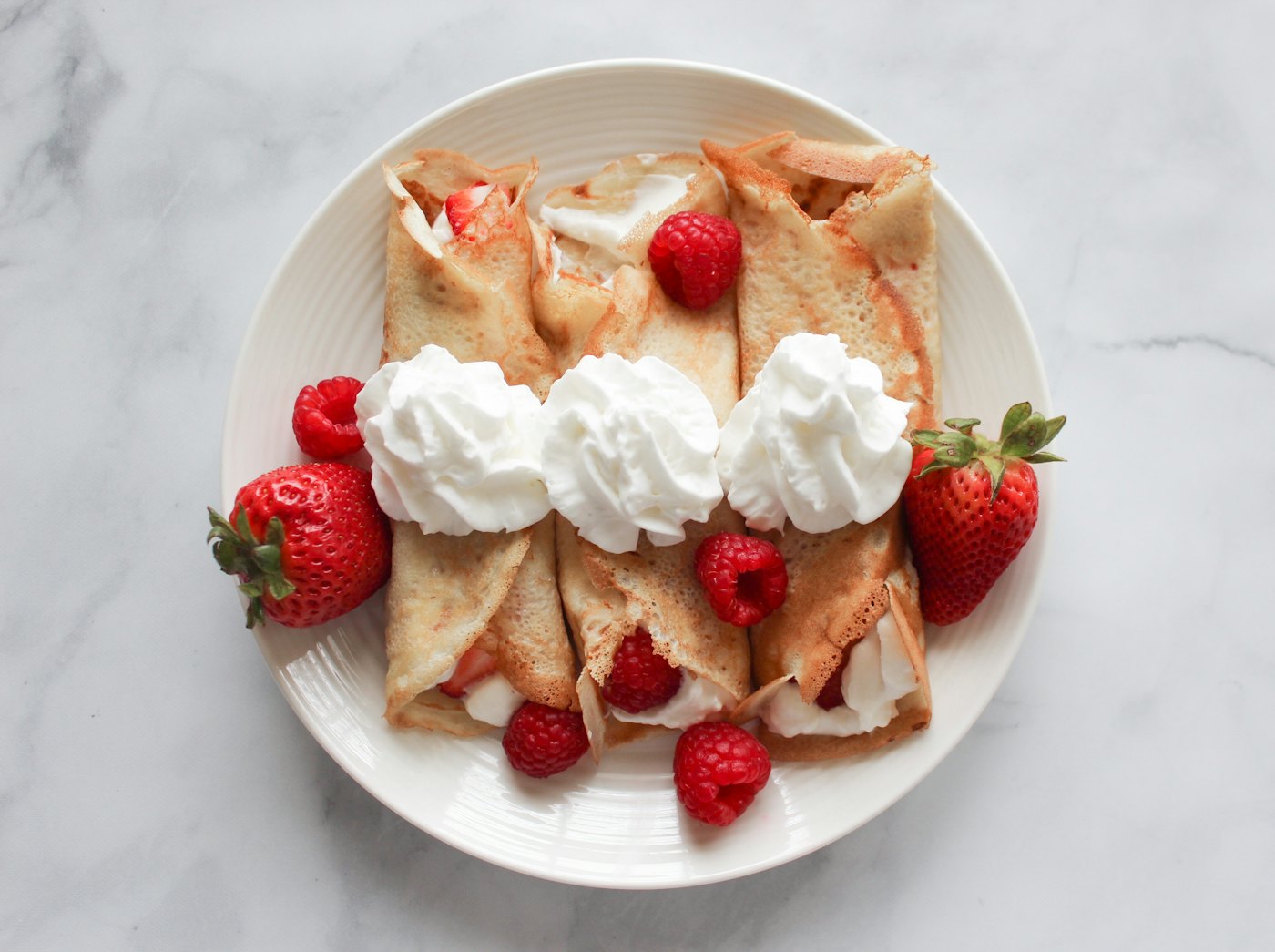 Loaded ice cream cones with berries