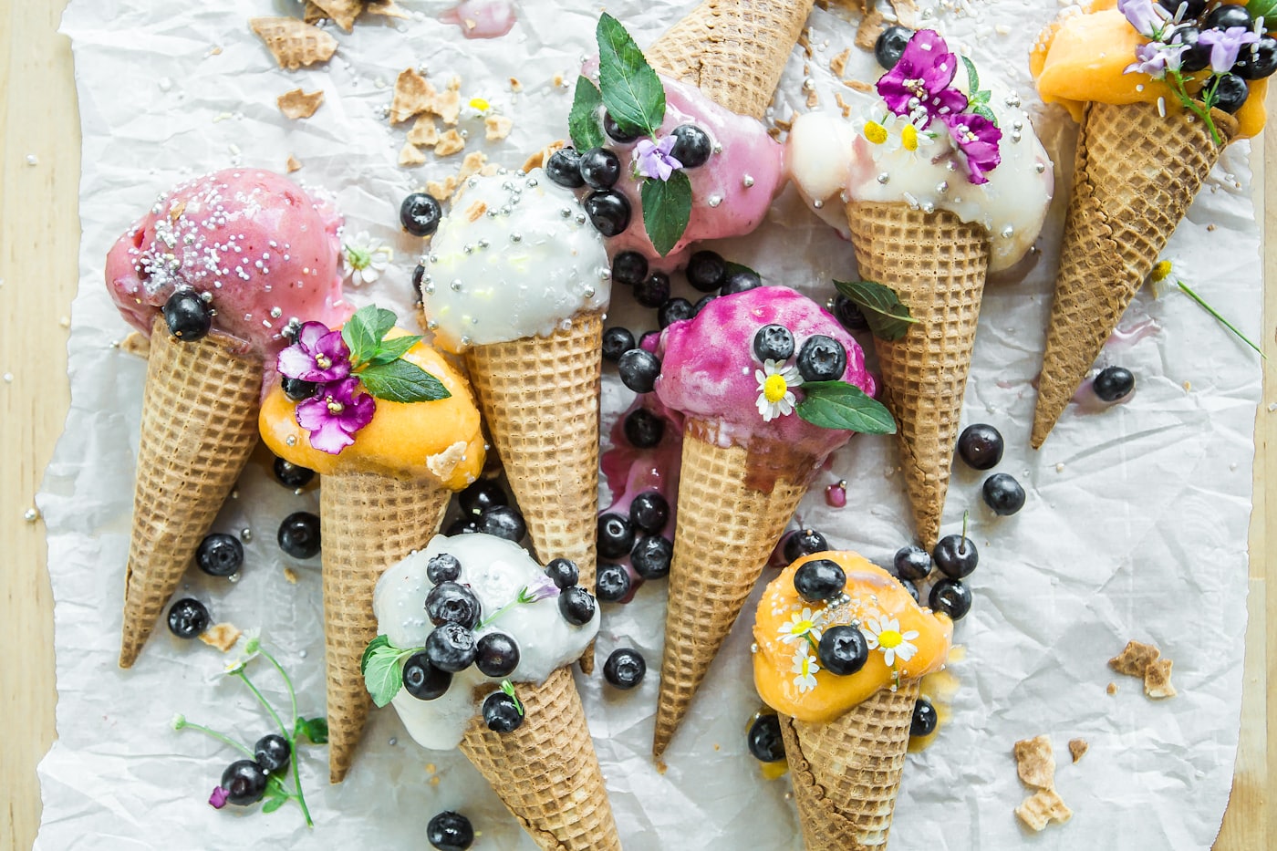 Ice cream cones with colourful toppings